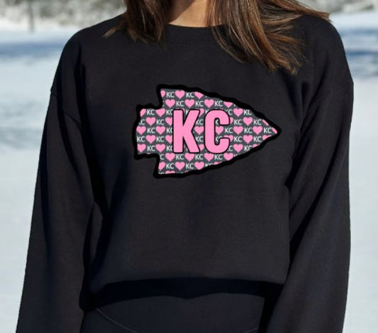 KC pink arrow
